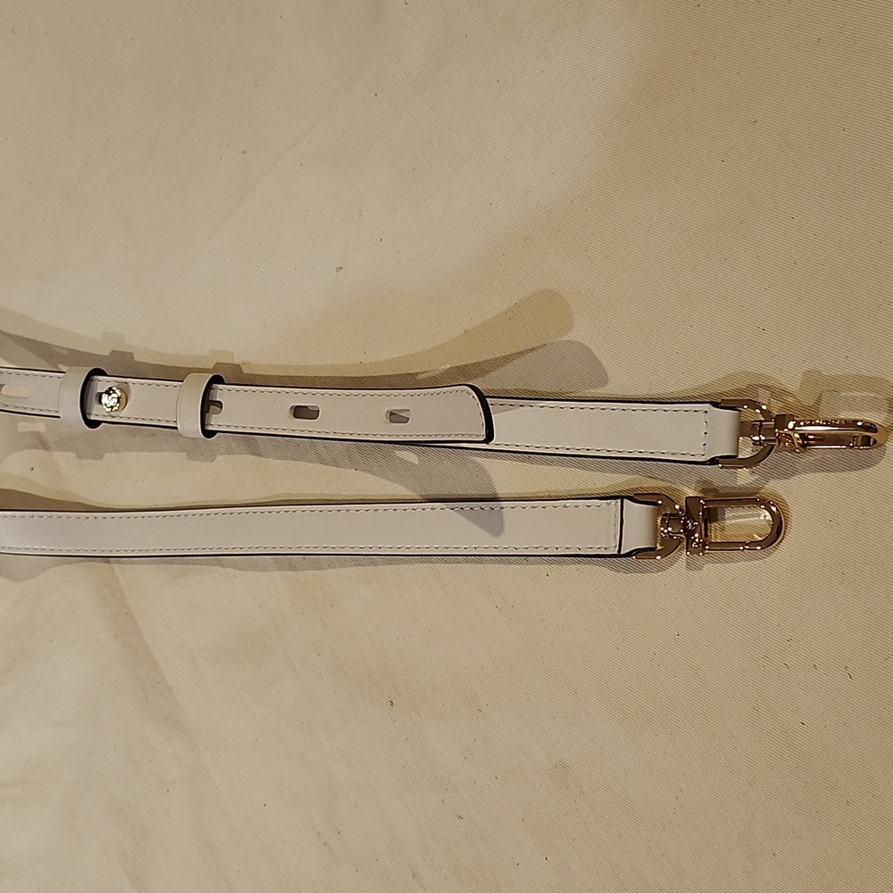 Michael Kors white leather buckle for crassbady bag strap with gold engraved log